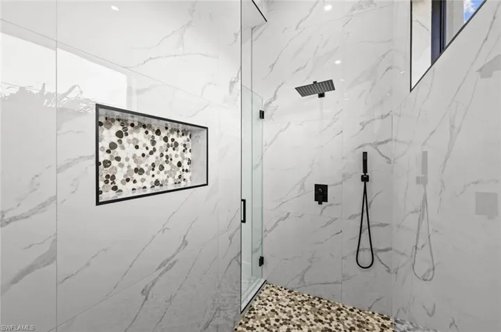 Bathroom featuring an enclosed shower