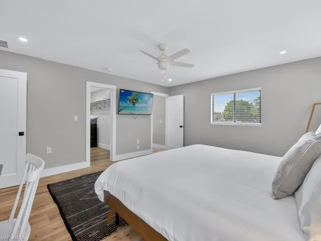 Primary bedroom, view of large walk-in closet and en suite
