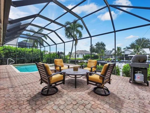 View of pool featuring grilling area