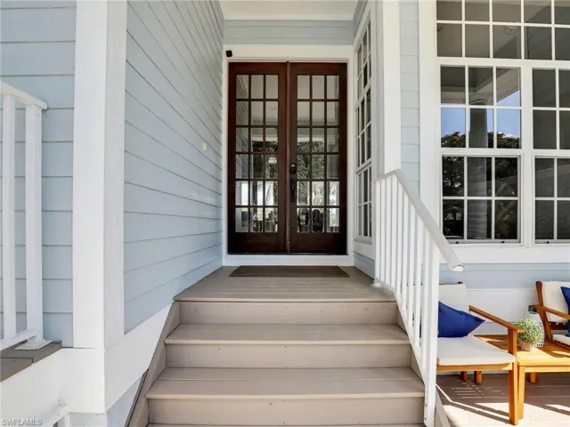 Doorway to property featuring french doors