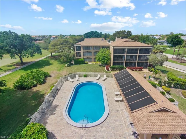 Community pool featuring a patio area