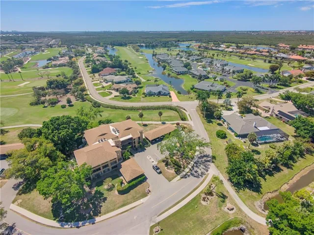 View of property location featuring nearby suburban area and a nearby body of water