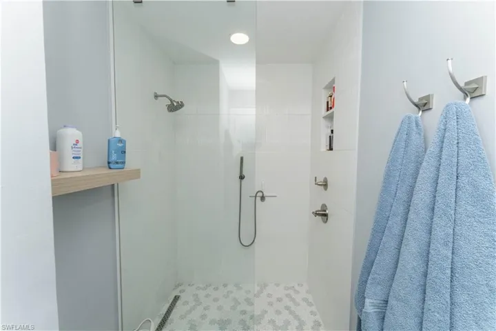 Full bath featuring walk in shower