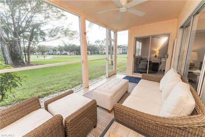 Sunroom / solarium featuring outdoor lounge area, a ceiling fan, and a patio