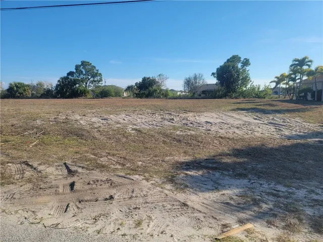 View of yard with a rural view