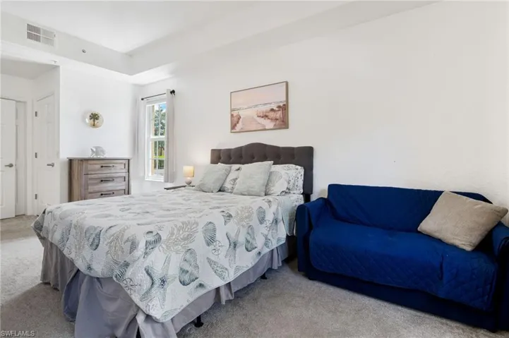Bedroom with carpet