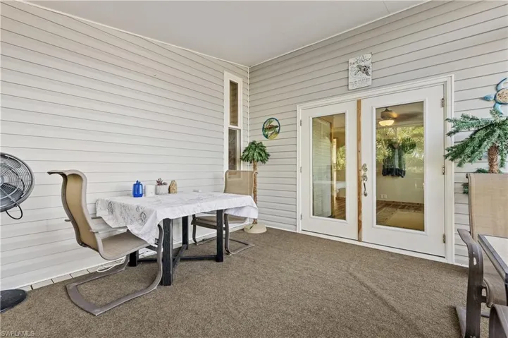 Screened porch french doors to office