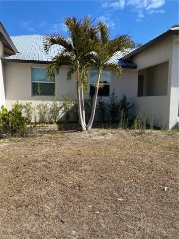 View of home's exterior with stucco siding