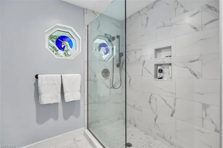 Owner's Suite Bathroom with walk-in shower.  Commode and bidet also here.