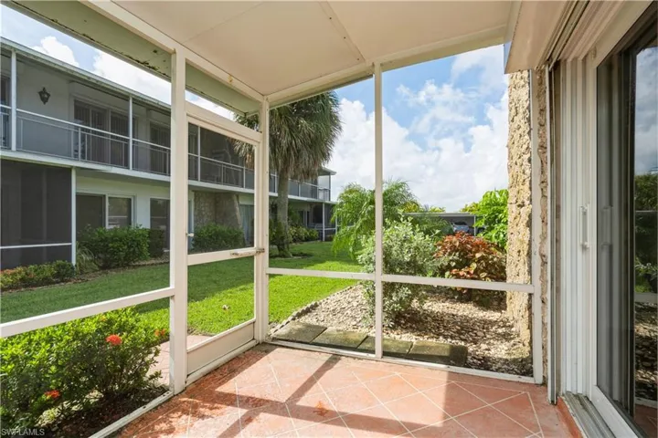 Unfurnished sunroom featuring a healthy amount of sunlight