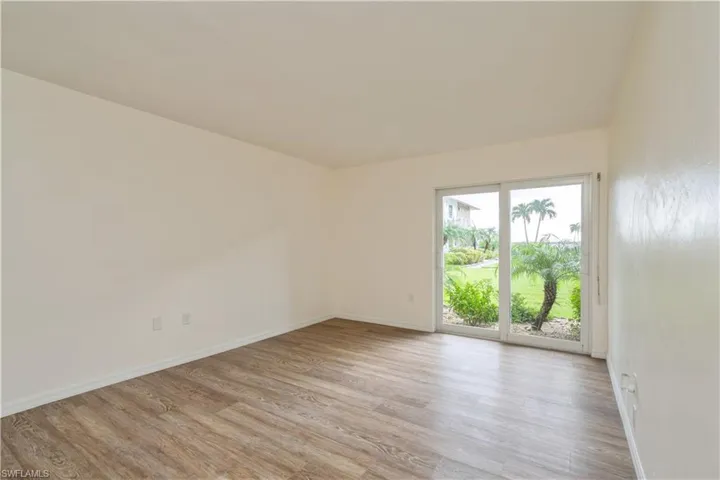 Empty room featuring light wood-type flooring