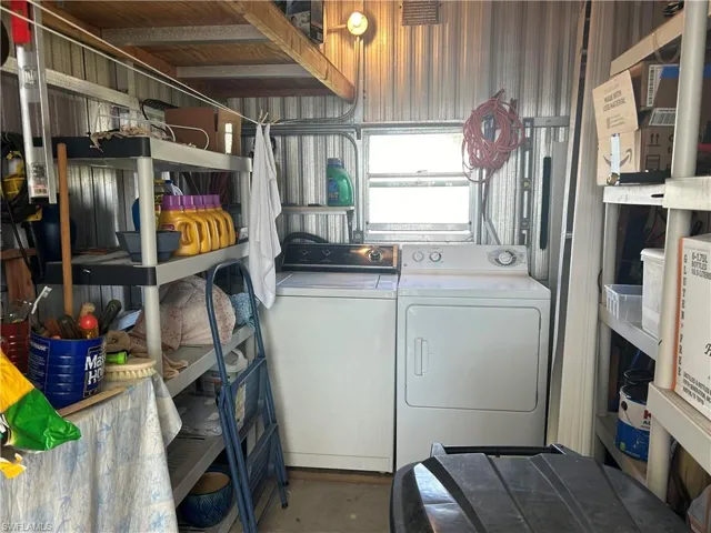 Laundry area featuring washer and clothes dryer