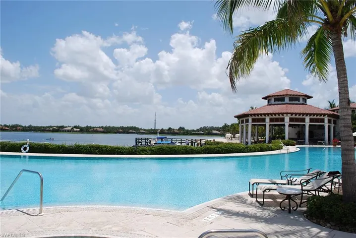 View of pool featuring a gazebo and a water view