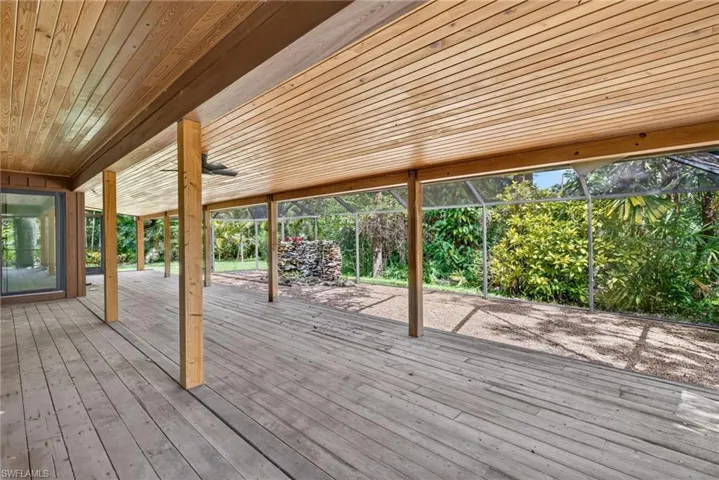 Beautiful wood deck and ceiling looking out to the river