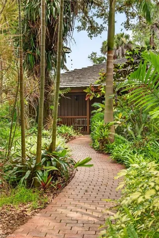 Brick paver pathway to the front door from driveway