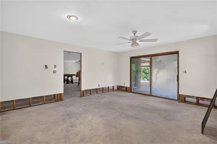 Primary bedroom with sliding doors to the back deck