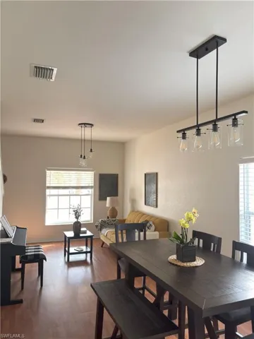 Dining space with wood finished floors