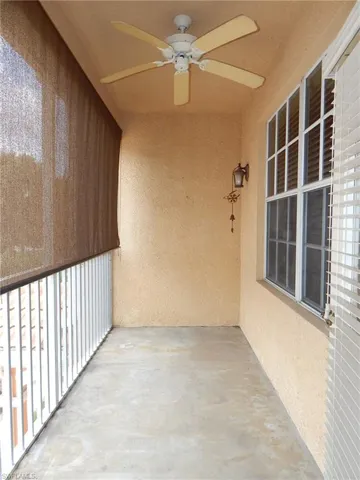 View of patio with ceiling fan