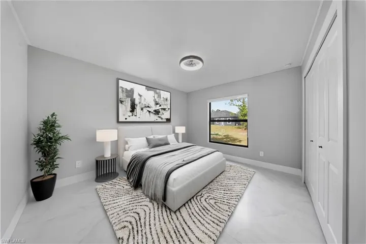 GUEST Bedroom #2-featuring baseboards and a closet