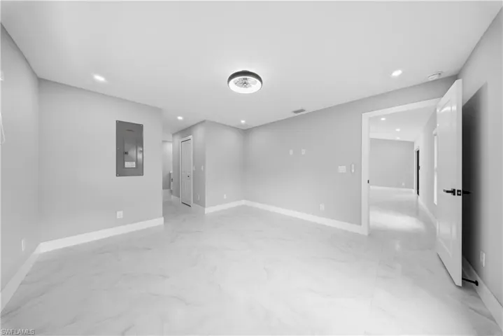 MASTER BEDROOM featuring electric panel and recessed lighting