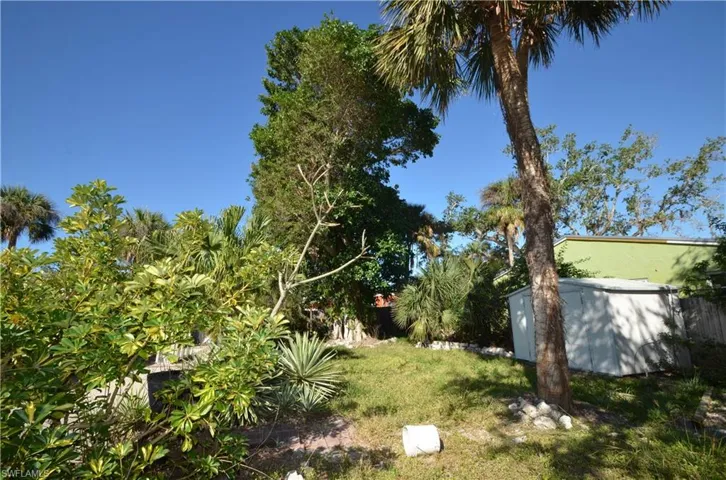 Extra lot has lots of room and a shed.