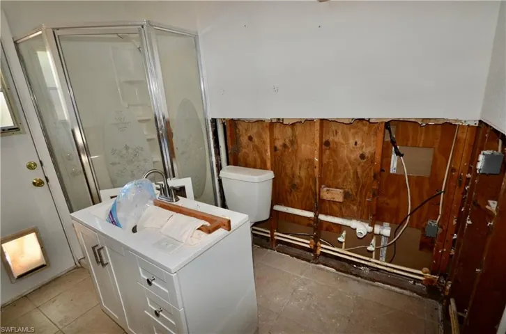 Master Bath has door leading outside.
