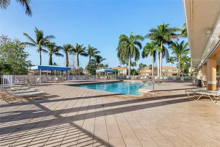 Community pool with a patio area