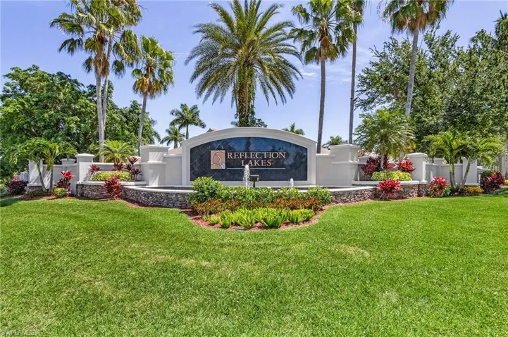 Community sign featuring a yard