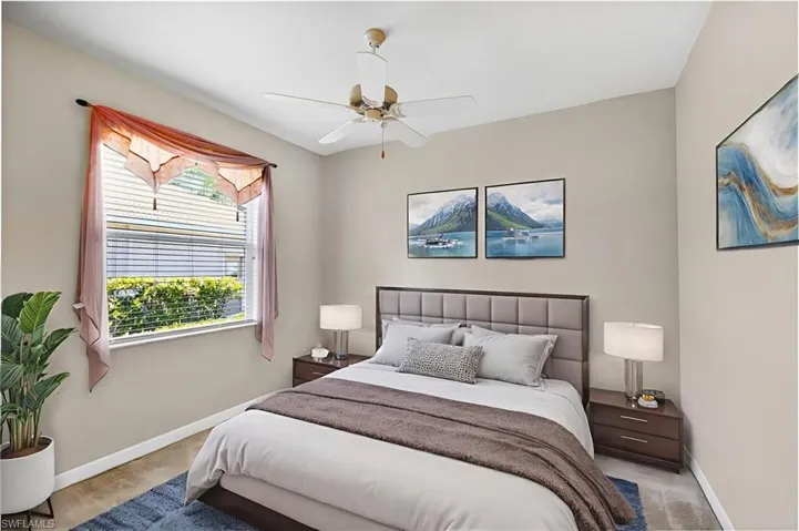 Bedroom featuring carpet flooring and ceiling fan