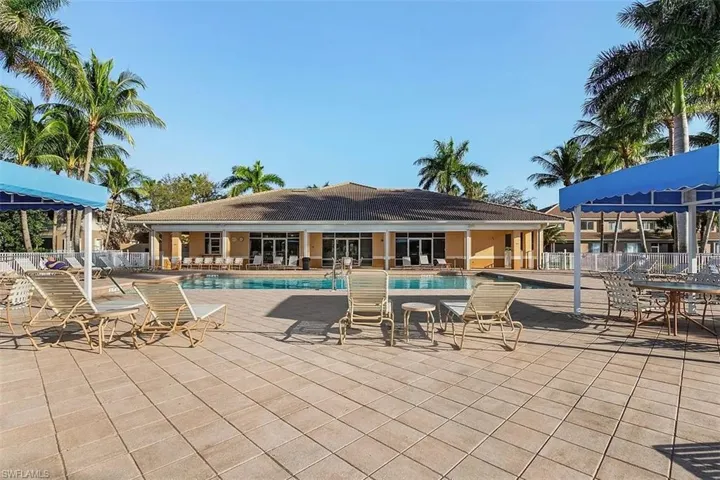Community pool featuring a patio area