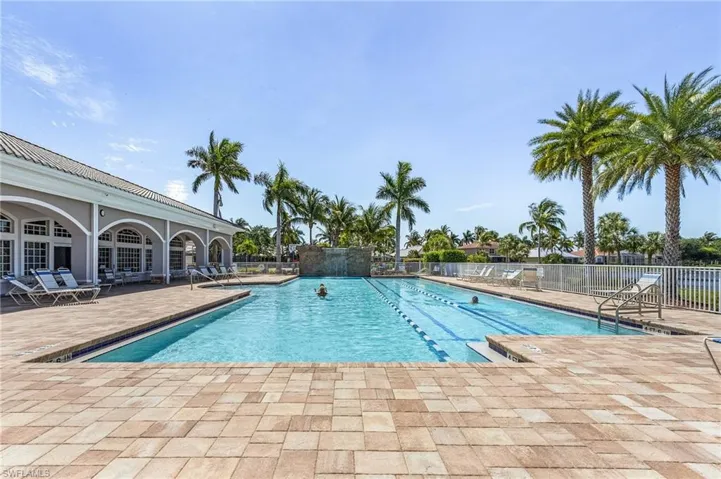 Community pool with a patio area