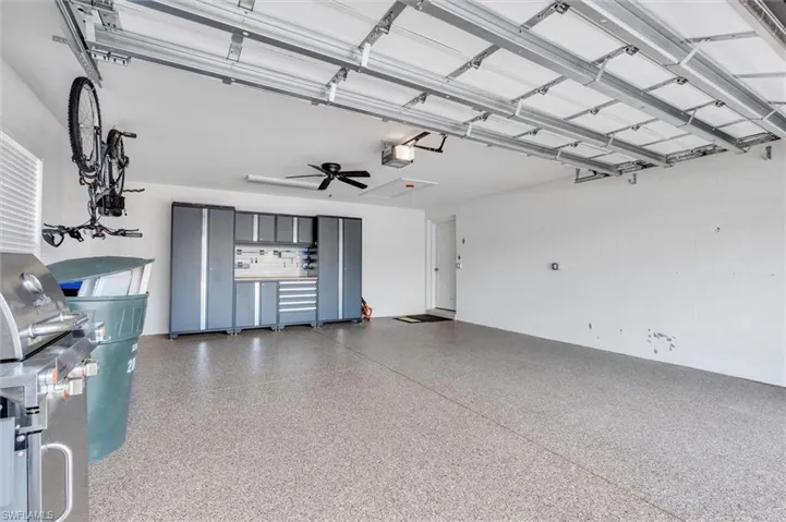 Epoxy floor and custom cabinets for storage