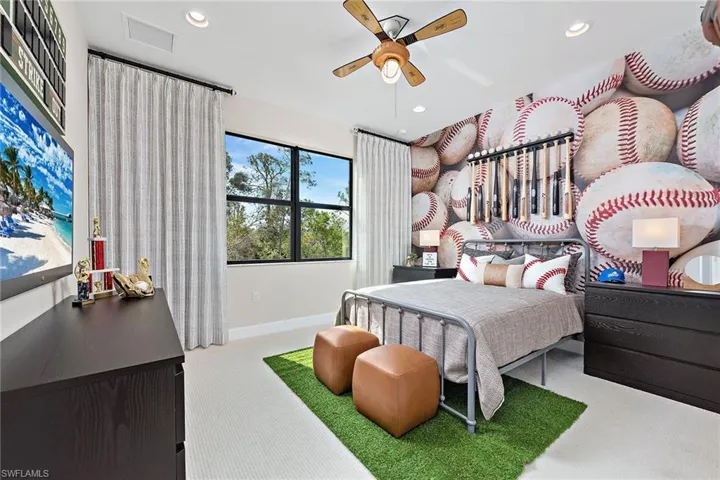 Bedroom featuring carpet flooring and ceiling fan