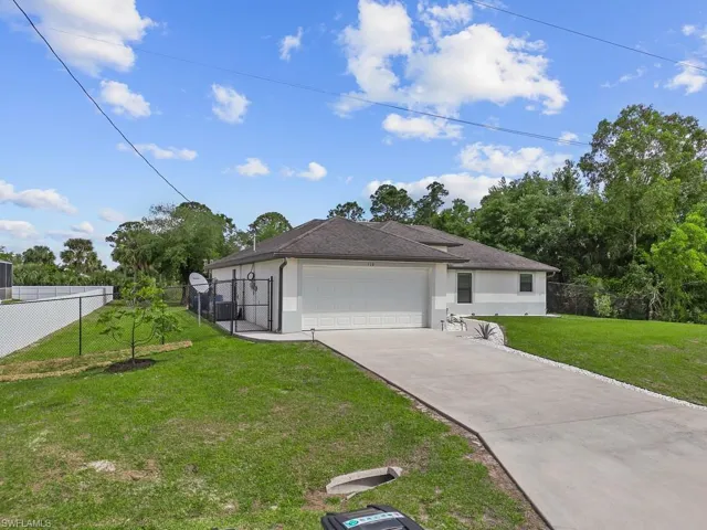 718  Plumosa  AVE, Lehigh Acres, FL 33972