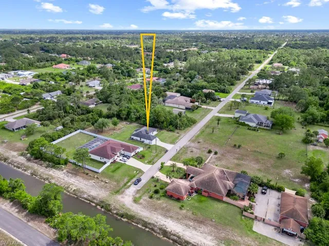 718  Plumosa  AVE, Lehigh Acres, FL 33972