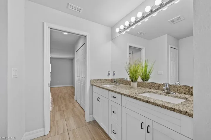 718  Plumosa  AVE, Lehigh Acres, FL 33972