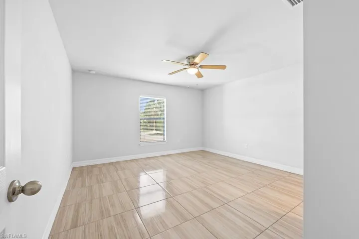 718  Plumosa  AVE, Lehigh Acres, FL 33972