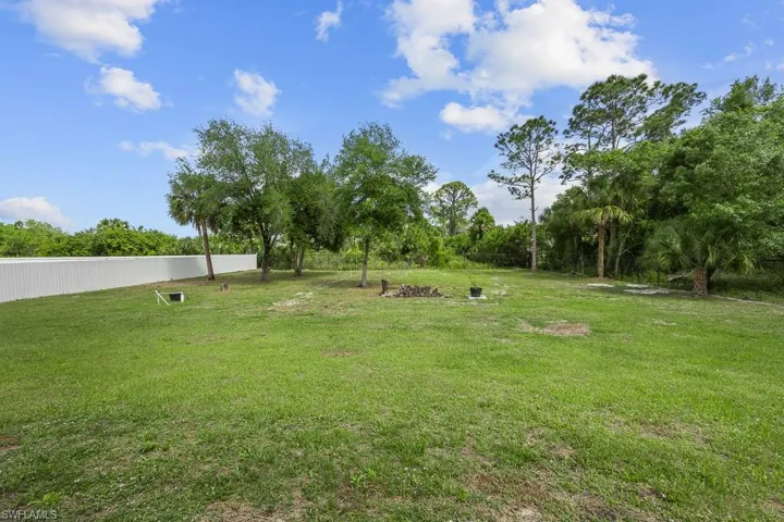 718  Plumosa  AVE, Lehigh Acres, FL 33972