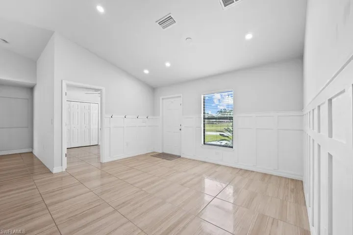 718  Plumosa  AVE, Lehigh Acres, FL 33972