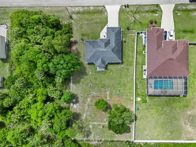 718  Plumosa  AVE, Lehigh Acres, FL 33972
