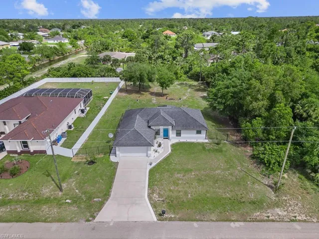 718  Plumosa  AVE, Lehigh Acres, FL 33972