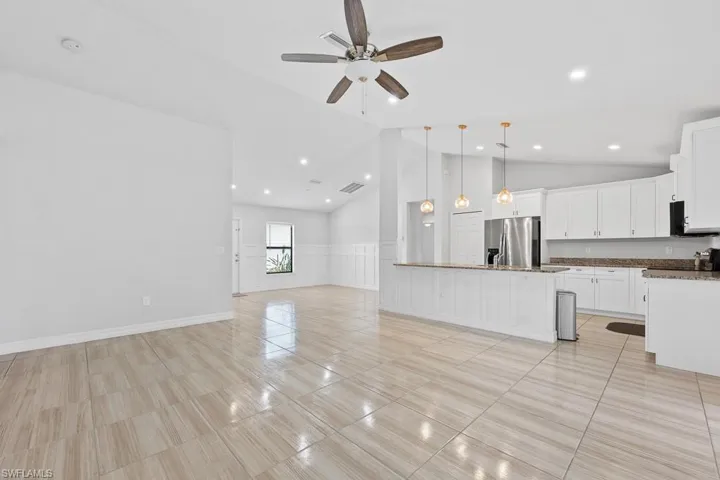 718  Plumosa  AVE, Lehigh Acres, FL 33972