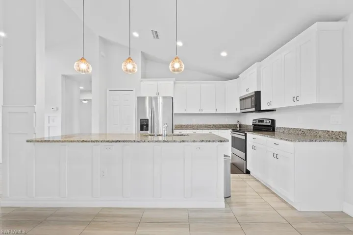 718  Plumosa  AVE, Lehigh Acres, FL 33972