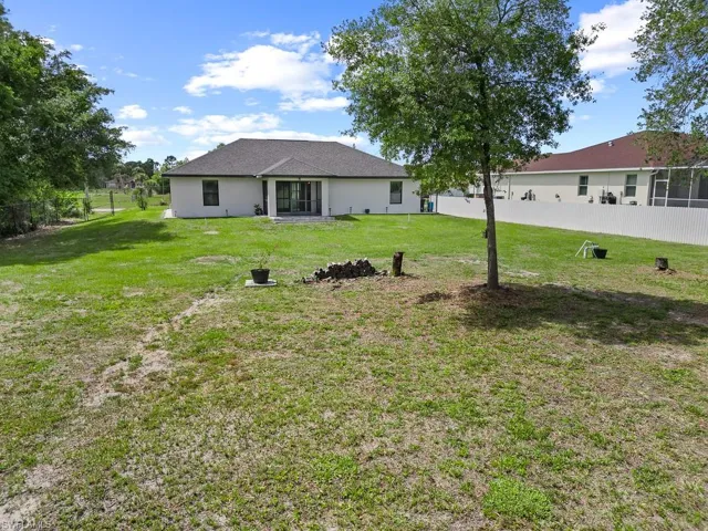 718  Plumosa  AVE, Lehigh Acres, FL 33972