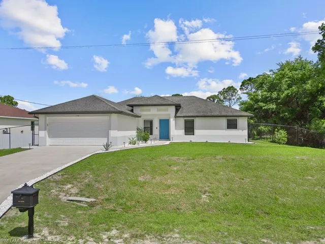 718  Plumosa  AVE, Lehigh Acres, FL 33972