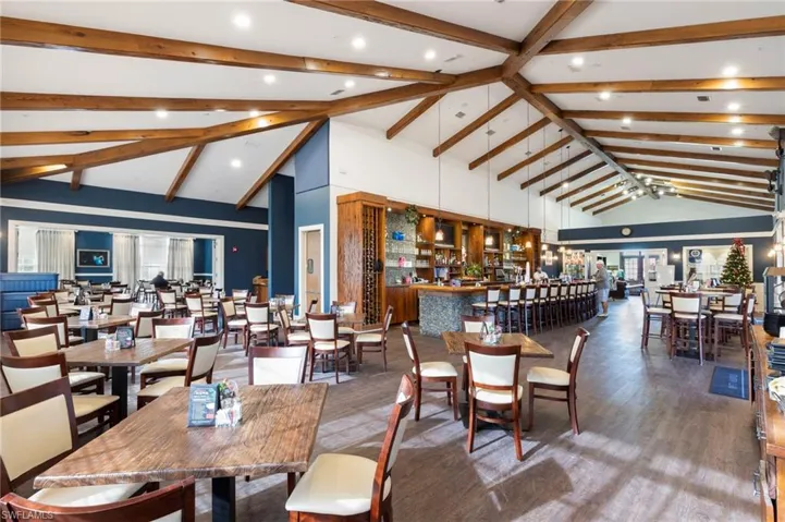 Dining space featuring wood finished floors and recessed lighting