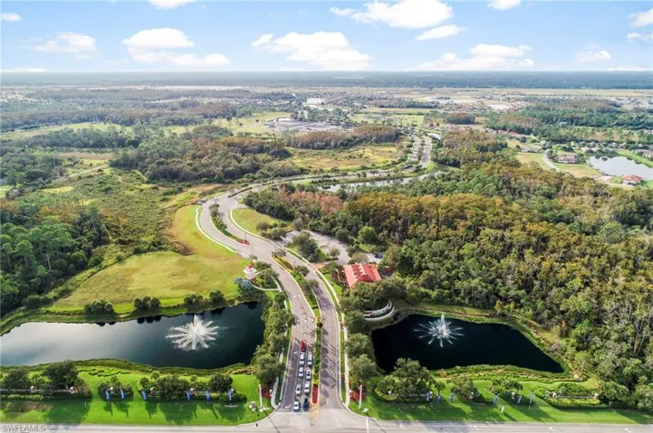 Aerial view of property's location featuring a nearby body of water