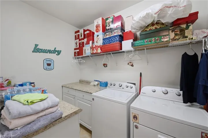Laundry area featuring washing machine and dryer