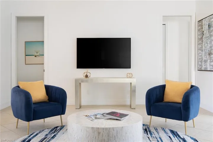 Tiled living area with baseboards