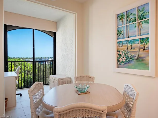 Glassed in sun room, the perfect place for an office or flex space
